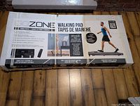 Sealed GoZone walking pad box showing product image and branding