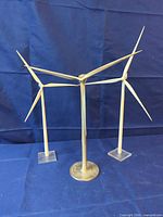 All three windmill models together on blue backdrop