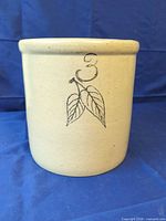 Full view of crock showing capacity mark and cobalt leaf motif