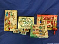 Group view of all ornament boxes and tree topper