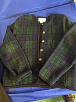 Front view of Tally Ho plaid wool cardigan