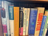 Left section of shelf showing Blind Man’s Bluff through Lord Peter