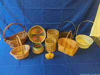 Group shot of all ten wicker baskets against blue backdrop