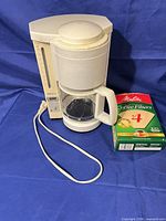 Front view of Krups coffee maker with Melitta filter box