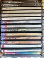 First stack showing top portion of collection including Austrian Royal Court Composers through Claude Bolling titles