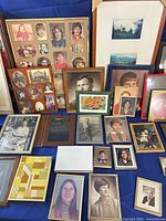 Overall grouping of assorted frames displayed on table