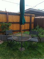 Full patio set: table, 2 chairs, umbrella, base