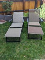 Front view of both loungers fully extended on grass