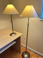Floor and table lamps showing overall design, shades, height relationship