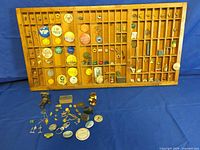 Full view of wooden printer tray with contents