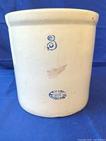 Front view showing capacity number, wing logo and maker’s stamp