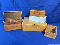 Group shot of five wooden boxes: maple, jewellery organiser, cedar, white, Yeast Foam crate