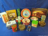 All tins grouped to show quantity, shapes and designs