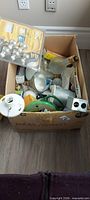 box of assorted bulbs and electrical items