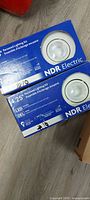 Two sealed NDR Electric 4.25" recessed lighting kit boxes