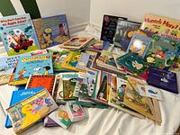 Wide view of entire mixed lot of books and activity sets