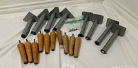 Full set of metal and wood legs with hardware bag displayed