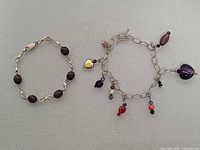 Both bracelets side by side showing designs and relative size