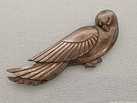 Front view showing full dove design and condition