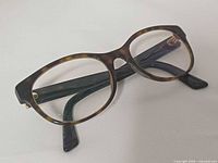 Angled top view of tortoiseshell Dolce & Gabbana eyeglasses showing overall frame shape and lenses