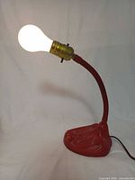 Lamp illuminated with bulb, showing overall profile