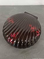 Closed clamshell-shape jewelry box top view
