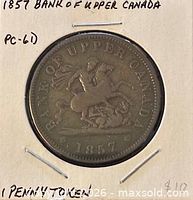 Obverse of 1857 Bank of Upper Canada penny token in holder