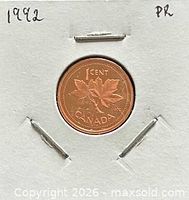 Coin in protective 2x2 cardboard holder marked 1992 PR