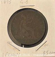 Coin in cardboard flip, reverse side showing seated Britannia dated 1875