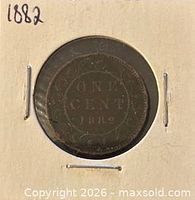 Reverse side of 1882 Canadian one-cent coin in flip