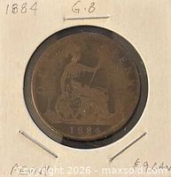 Obverse of 1884 penny in holder showing Britannia reverse