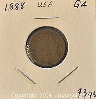 Obverse of 1888 Indian Head cent in holder with annotations