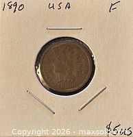 Obverse of 1890 Indian Head cent in cardboard holder