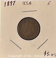 Obverse of 1897 Indian Head cent in cardboard flip