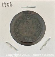 Reverse of 1906 Canadian one-cent coin in flip