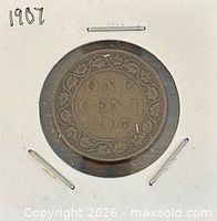 Reverse side showing ONE CENT 1907 within maple leaf wreath