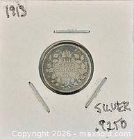 Reverse: crowned maple-leaf wreath with denomination and date