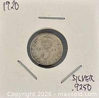 Reverse side showing crowned 3 and wreath