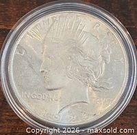 Obverse of 1923 Peace Dollar in capsule