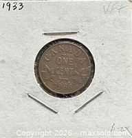 Coin in 2×2 holder showing maple leaf reverse and date
