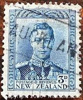 Front view of the 3d New Zealand King George VI stamp showing portrait, denomination and cancellation