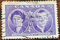 Front of stamp showing portraits, denomination and cancellation