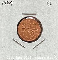 Reverse view showing 1964 date, maple leaf design and denomination