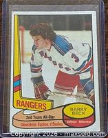 Front of 1980-81 O-Pee-Chee Barry Beck #90 hockey card in sleeve