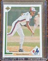 Front of 1991 Upper Deck Dennis Martínez #385 card in sleeve