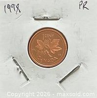reverse side of 1998 Canadian one cent proof coin in holder