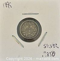 Obverse of coin in holder
