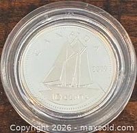 Reverse showing Bluenose schooner, denomination and year