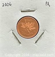 Reverse view of 2006 Canada one cent coin in holder