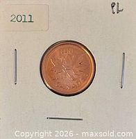 Obverse showing Queen Elizabeth II effigy in holder